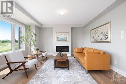 709 Fenwick Way, Ottawa, ON - Indoor Photo Showing Living Room With Fireplace