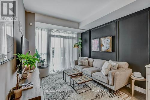 409 - 50 George Butchart Drive, Toronto, ON - Indoor Photo Showing Living Room