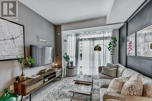 409 - 50 George Butchart Drive, Toronto, ON - Indoor Photo Showing Living Room