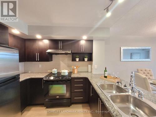 680 - 23 Cox Boulevard, Markham, ON - Indoor Photo Showing Kitchen With Double Sink With Upgraded Kitchen