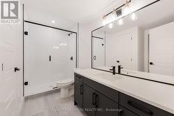 3pc bath, tiled shower and quartz vanity - 