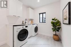 Main Floor Laundry Room with Quartz Counters - 