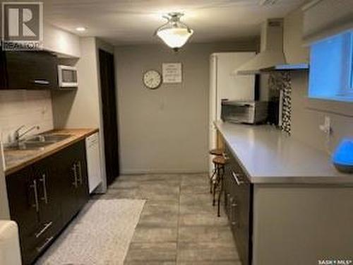 402 2Nd Avenue W, Meadow Lake, SK - Indoor Photo Showing Kitchen With Double Sink