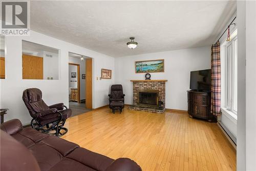 3483 Route 134, Shediac Cape, NB - Indoor Photo Showing Living Room With Fireplace