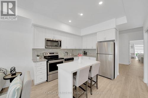 206 - 8825 Sheppard Avenue E, Toronto, ON - Indoor Photo Showing Kitchen With Stainless Steel Kitchen