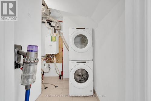 206 - 8825 Sheppard Avenue E, Toronto, ON - Indoor Photo Showing Laundry Room