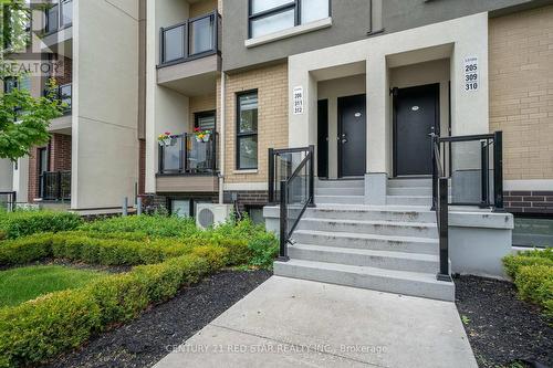 206 - 8825 Sheppard Avenue E, Toronto (Rouge), ON - Outdoor With Balcony With Facade