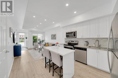 206 - 8825 Sheppard Avenue E, Toronto (Rouge), ON - Indoor Photo Showing Kitchen With Stainless Steel Kitchen With Upgraded Kitchen