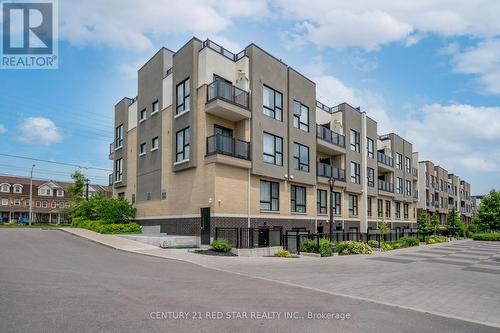 206 - 8825 Sheppard Avenue E, Toronto (Rouge), ON - Outdoor With Balcony With Facade