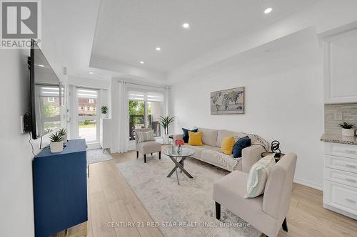 206 - 8825 Sheppard Avenue E, Toronto, ON - Indoor Photo Showing Living Room