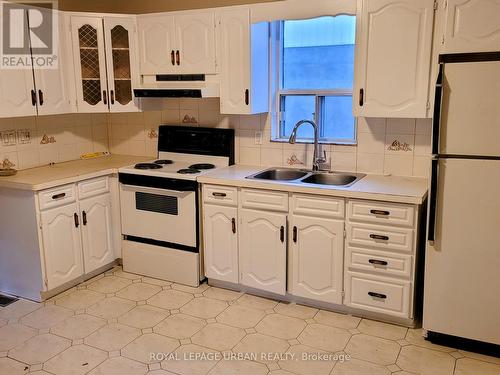 8 Heather Road, Toronto, ON - Indoor Photo Showing Kitchen With Double Sink