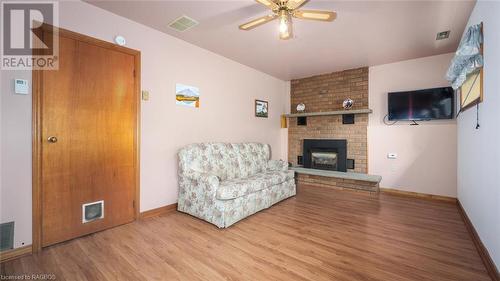 15 Brackenbury Street, Markdale, ON - Indoor Photo Showing Living Room With Fireplace