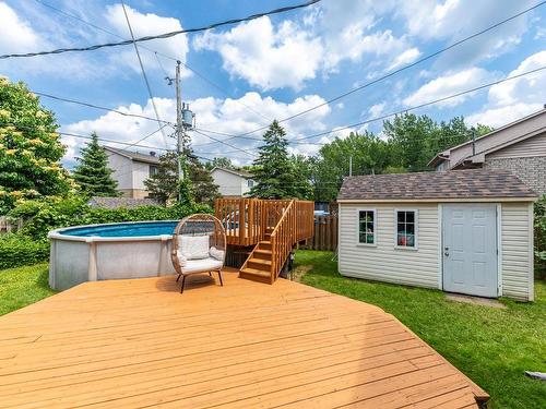 Cour - 7062 Rue Des Bégonias, Longueuil (Saint-Hubert), QC - Outdoor With Above Ground Pool