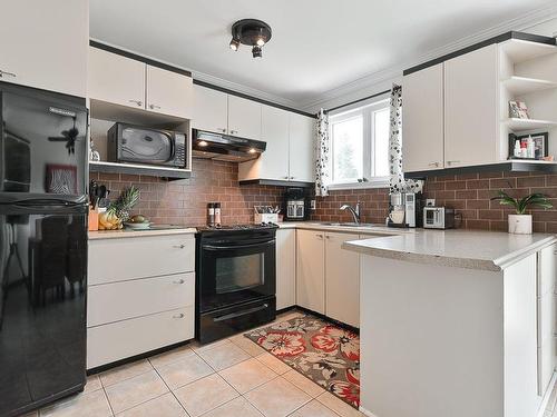 Kitchen - 5310 Crois. Beaumanoir, Brossard, QC - Indoor Photo Showing Kitchen