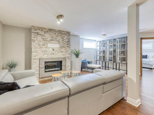 Family room - 107 Rue St-Pierre E., Saint-Sauveur, QC - Indoor Photo Showing Living Room With Fireplace