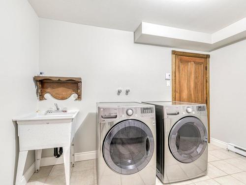 Salle de lavage - 107 Rue St-Pierre E., Saint-Sauveur, QC - Indoor Photo Showing Laundry Room