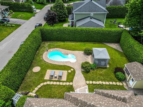 Aerial photo - 107 Rue St-Pierre E., Saint-Sauveur, QC - Outdoor With Backyard