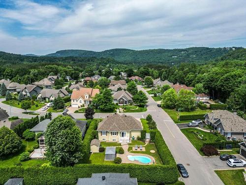 Aerial photo - 107 Rue St-Pierre E., Saint-Sauveur, QC - Outdoor With View