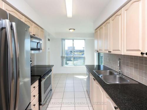 603-4850 Glen Erin Dr, Mississauga, ON - Indoor Photo Showing Kitchen With Double Sink