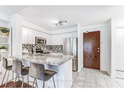 913-11 Michael Power Pl, Toronto, ON - Indoor Photo Showing Kitchen With Stainless Steel Kitchen With Upgraded Kitchen