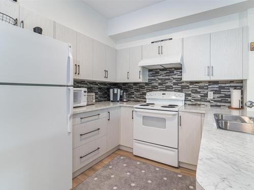 2207-1873 Country Club Drive, Kelowna, BC - Indoor Photo Showing Kitchen With Double Sink