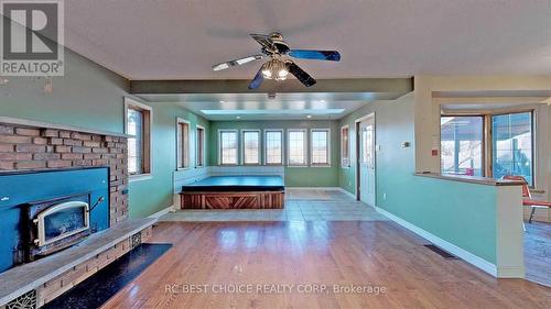 571 Hickory Beach Road, Kawartha Lakes, ON - Indoor Photo Showing Other Room With Fireplace