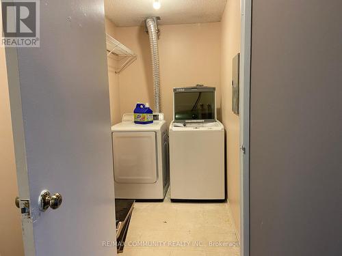 603 - 5 Rowntree Road, Toronto (Mount Olive-Silverstone-Jamestown), ON - Indoor Photo Showing Laundry Room