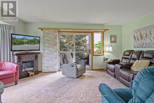 201 - 914 Ford Street W, Peterborough, ON - Indoor Photo Showing Living Room With Fireplace