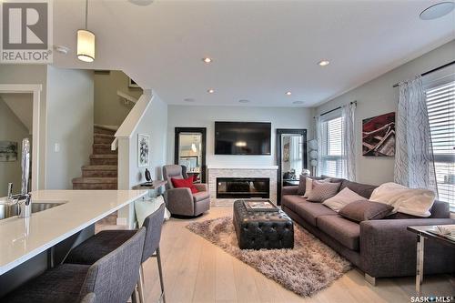 308 Myles Heidt Lane, Saskatoon, SK - Indoor Photo Showing Living Room With Fireplace