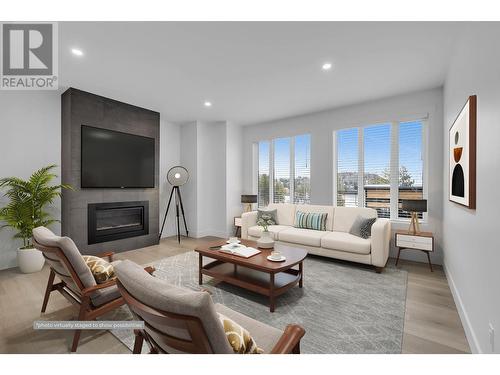 2835 Canyon Crest Drive Unit# 26, West Kelowna, BC - Indoor Photo Showing Living Room With Fireplace