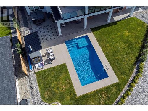 5711 Jasper Way, Kelowna, BC - Outdoor With In Ground Pool