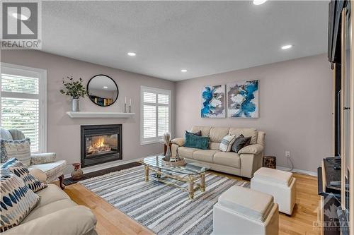 122 Marshfield Street, Ottawa, ON - Indoor Photo Showing Living Room With Fireplace