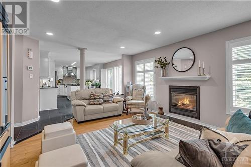 122 Marshfield Street, Ottawa, ON - Indoor Photo Showing Living Room With Fireplace