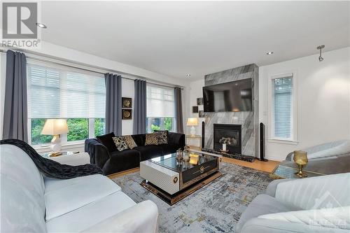 15 Marwood Court, Ottawa, ON - Indoor Photo Showing Living Room With Fireplace