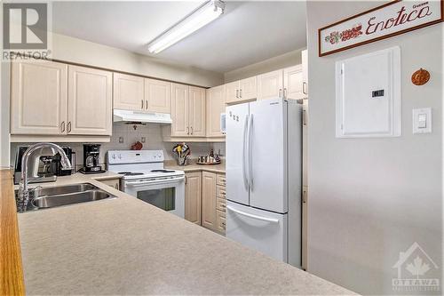 120 Grant Carman Drive Unit#706, Ottawa, ON - Indoor Photo Showing Kitchen With Double Sink