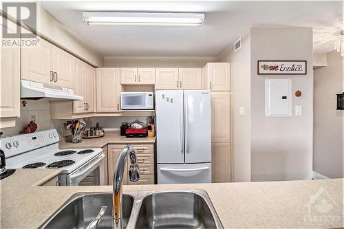 120 Grant Carman Drive Unit#706, Ottawa, ON - Indoor Photo Showing Kitchen With Double Sink