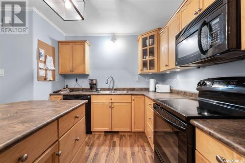 702 715 Hart Road, Saskatoon, SK - Indoor Photo Showing Kitchen With Double Sink