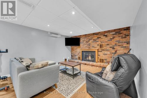 117 Adis Avenue, Hamilton, ON - Indoor With Fireplace