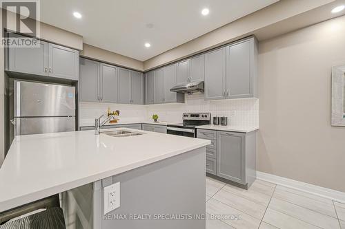 60 Spinland Street, Caledon, ON - Indoor Photo Showing Kitchen With Stainless Steel Kitchen With Double Sink