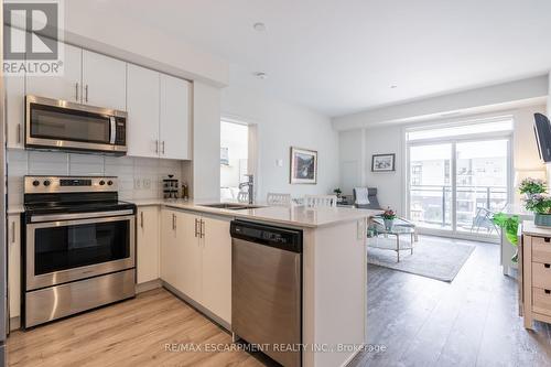 512 - 340 Plains Road E, Burlington, ON - Indoor Photo Showing Kitchen With Stainless Steel Kitchen With Double Sink