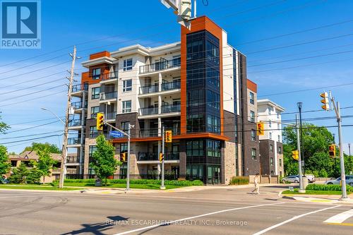 512 - 340 Plains Road E, Burlington, ON - Outdoor With Balcony With Facade