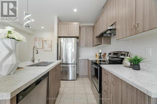 5 Dufay Road, Brampton, ON - Indoor Photo Showing Kitchen With Stainless Steel Kitchen With Double Sink With Upgraded Kitchen