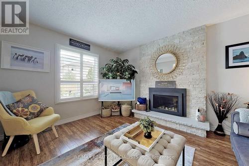 65 Clayton Crescent, Clarington, ON - Indoor Photo Showing Living Room With Fireplace