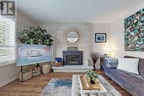 65 Clayton Crescent, Clarington, ON - Indoor Photo Showing Living Room With Fireplace