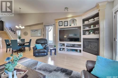 1543 Lakeridge Drive N, Regina, SK - Indoor Photo Showing Living Room With Fireplace