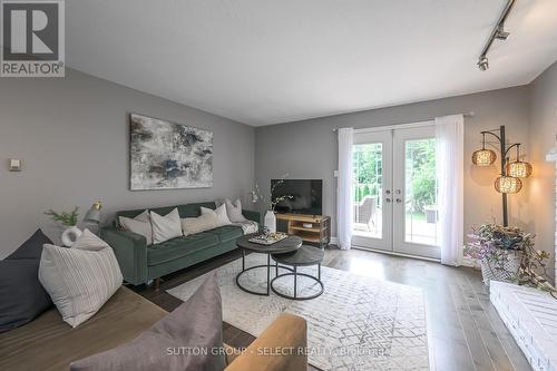 Living room with backyard deck access - 289 Blackacres Boulevard, London, ON 