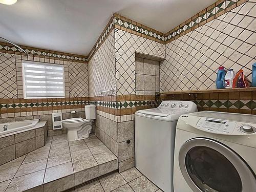 Salle de bains - 170  - 174 Rue Denoncourt, Lavaltrie, QC - Indoor Photo Showing Laundry Room