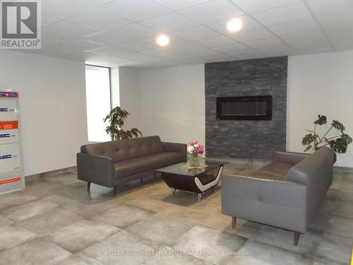 505 - 3065 Queen Frederica Drive, Mississauga, ON - Indoor With Fireplace