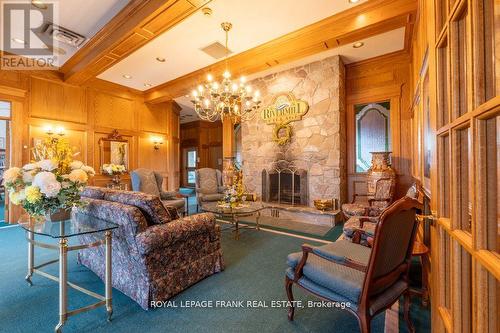 209 - 51 Rivermill Boulevard, Kawartha Lakes, ON - Indoor With Fireplace