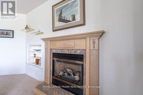 209 - 51 Rivermill Boulevard, Kawartha Lakes, ON - Indoor With Fireplace